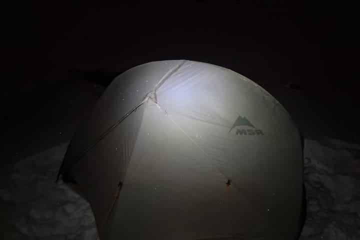 A lightly frosted tent in the evening