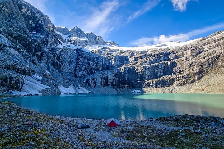 Many flat options to camp after crossing the lake outlet