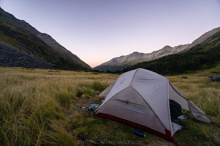 Camping outside the hut in the tussock